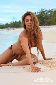 And in 1997, she became the first black woman to grace the cover all on her own. Si Swimsuit 2019 Tyra Banks Camille Kostek Alex Morgan Each Land Solo Cover Swimsuit Si Com