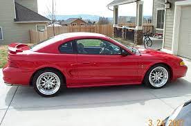 Black 94 cobra and red 95 cobra hill climb. Pics Of Rio Red Sn95 Cobras With 18s Sn95 Mustang Mustang Bmw