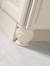 Place Furniture Grade Decorative Feet Under Select Cabinetry To Raise The Desi Kitchen Cabinet Accessories Semi Custom Kitchen Cabinets Custom Kitchen Cabinets