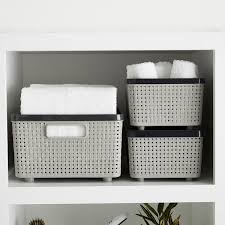 Plastic And Decorative Baskets Are Great For Storing Towels And Washcloths In Your Bathroom Linen Closet Storage Bins Fabric Storage Bins Woven Baskets Storage