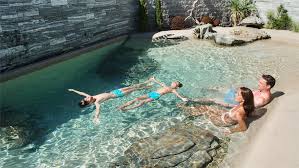 Biodesignpools Poolbau Partner Kriegergut Ihr Personliches Strand Und Badehighlight Hinterhof Strand Poolbau Naturschwimmbad