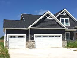 Royal Ironstone Dark Grey Siding And Dark Grey Shakes Decorative Gable Accents White Trim Certainteed Mor Gray House Exterior Black House Exterior Stucco Homes