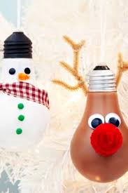 Create New Christmas Decorations With Old Light Bulbs Follow These Steps To Make These Ado Christmas Light Ornament Light Bulb Ornaments Christmas Light Bulbs