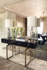 The Modern Sideboard In This Hallway Creates A Contemporary Look And The Mirror Gives A Feeling Of Space Www Narrow Hallway Decorating Hall Decor Home Decor