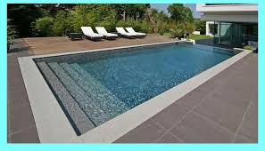 Concrete Pools Vs Fiberglass Pools Concrete Pool Backyard Pool Pool Deck Tile