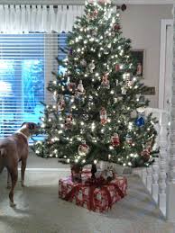 The Christmas Tree Skirt Made From A Box Covered With Wrapping Paper And Add Christmas Tree Stand Diy Christmas Tree Stand Cover Christmas Tree Box Stand