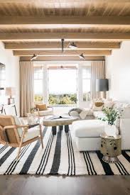 Beach House Living Room Relaxed Living Room Style Blue And White Stripe Rug Beach House Living Room Furniture Design Living Room Beautiful Living Rooms