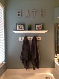 20 Wall Decorating Ideas For Your Bathroom Housely Brown Bathroom Decor Small Bathroom Decor Bathroom Wall Decor