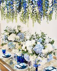 24 Flower Chandeliers To Give Your Wedding A Garden Fresh Feel Blue Wedding Flowers Wedding Centerpieces Blue Wedding Decorations