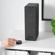 Ikea S Remote Control For Sonos Speakers Is A Simple Puck Like Device Sonos Speakers Sonos Bookcase With Glass Doors