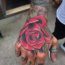 Hand tattoos, especially on palms, are not common. 50 Amazing Rose Hand Tattoos