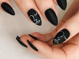 This edgy manicure screams, do not even try to mess with me! and a matte finish is achieved quite easily: 30 Zero Shine Matte Black Nail Looks