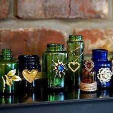 How To Decorate Glass Bottles And Jars With Jewelry Petticoat Junktion Glass Bottle Diy Glass Bottle Crafts Glass Vase Decor