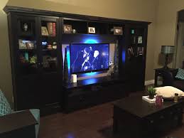 Ikea Hemnes Black Brown Unit With Trim For A Built In Look Add Base Board And Crown Moulding Stain Black To Match Hemnes Entertainment Room Decor The Unit