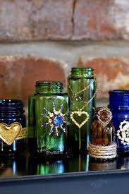How To Decorate Glass Bottles And Jars With Jewelry Petticoat Junktion Glass Bottle Crafts Glass Bottle Diy Recycled Glass Bottles