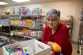 .are food bank executive director kate lombardo (holding the grant check) and tj billard, the plant general manager at international paper's container plant in putnam, ct. About Us Connecticut Food Bank