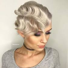 The contrast of faded sides show how thick hair is while eliminating the possibility of hair sticking straight out. Vintage Glam 18 Roaring 20s Hairstyles