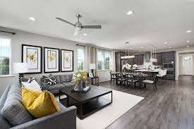 Bright Yellow Accents Arlington Model Home Great Room Kitchen Stephens City Grey Flooring Living Room Grey And Yellow Living Room Living Room Decor Gray