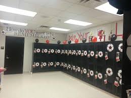 High School Locker Room Using Cricut Soccer Balls Jv Has The Smaller Ones With Number Va School Locker Decorations Locker Decorations Locker Room Decorations