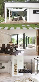 Bungalow Ebenleben Weberhaus Modernes Flachdach Haus Im Bauhausstil Mit Glasfassade Kamin Und Terrasse Flachdachhaus Bauhausstil Bauhausstil Haus