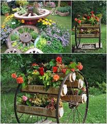 10 Amazing Ideas To Decorate Your Home With Wagon Wheels Decorative Garden Fencing Garden Projects Garden Yard Ideas