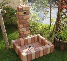 Totally Inspiring Decorative Garden Faucet Ideas 08 Brick Garden Diy Mail Water Faucet