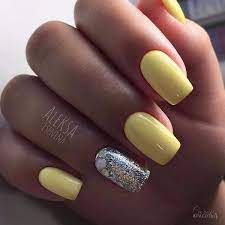 Looking for nail art inspiration? Pastel Yellow With Silver Touch Nail Art Design Shinny And Yellow The Perfect Summer Thing Unhas Decoradas Unhas Amarelas Unhas