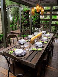 How To Decorate Outdoor Dining Table Terrace Patio With Wooden Furniture Set And Candles Diningtablede Outdoor Dining Room Outdoor Dining Outdoor Dining Table