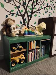 Ikea Trofast Bookshelf Hack Painted And Added Custom Shelves To Become A Montessori Friendly Toddler Bookshelf Ikea Bucherregal Regal