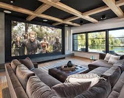 31 Home Theater Ideas That Will Make You Jealous Sebring Design Build Design Trends This home theater features black and white shade for additional elegance and beige carpet all these product options and efforts to reduce sound should keep the theatrical sounds in the room while keeping other noises out of it.