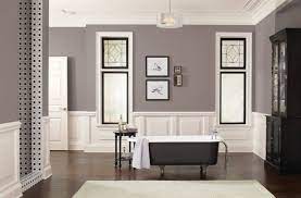 …beautiful color scheme idea with warm taupe walls combined with blues, eggplant and chartreuse to bring life in this colorful contemporary living room. Best Ideas For Decorating With Taupe Color