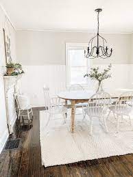 The deep wood pops against the light and bright paint colors in the rest of the room. The Best Farmhouse Paint Colors Micheala Diane Designs