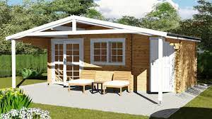 40 Mm Aus Holz In 6x3 M Mit Grosszugigem Vordach Inkl 2 Pfosten Unbehandelter Bausatz Hochwertige Leimholztur Und Gartenhaus Holz Gartenhaus Dachschindeln