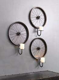 Bicycle Wheels And Chains Upcycled Into Wall Decoration Candle Sconces Bicycle Decor Wheel Decor Bicycle