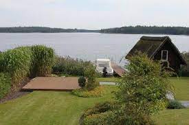 Komfort Ferienhaus Direkt Am Krakower See Inkl Grosser Garten Angelboot Mit 1 5 Ps Motor Ferienhaus Bootshaus Hausboot