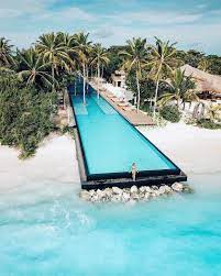 Who Wants To Sit On The Edge Of The Longest Infinity Pool In The Maldives Photo By Michutravel E Vacation Places Places To Travel Beautiful Places To Travel