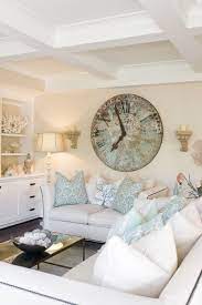 Large Wall Clocks Make A Statement Wall Art Wall Decor Living Room White Living Room Beach House Interior Design Beach House Interior Coastal Living Rooms
