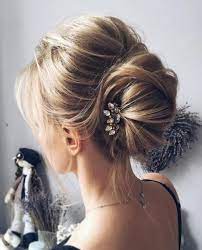 Cute hair accessories—bun cuffs, pins, and headbands—are the quickest find inspiration in these gorgeous and doable messy bun hairstyles that keep you looking pretty and polished on any day. 60 Updos For Thin Hair That Score Maximum Style Point