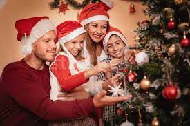 Family Decorating Christmas Tree Stock Photo C Milanmarkovic78 8540439 Stockfresh Christmas Tree Decorations Holiday Photography Christmas Tree