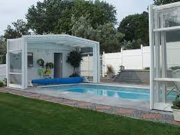 Year Round Pool Enclosures Also Make His Yard Look Great The Unit That Was Designed For Him Was Swimming Pools Pool Houses Swimming Pool Enclosures