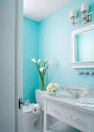 Delightful Aqua Powder Room With Walls Of Aqua Blue As Backdrop For Nickel Double Sconces And White Tiffany Blue Bathrooms Bathroom Colors Bathroom Colors Blue 20+ chic paint colors to transform your bathroom.