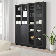 Billy Oxberg Bookcase With Panel Glass Doors Black Brown Glass 63x11 3 4x79 1 2 Ikea Glass Bookcase Glass Door Ikea