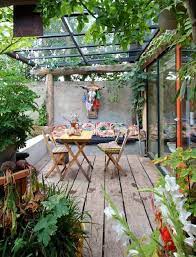 25 Tipps Und Tricks Wie Sie Ihre Terrasse Neu Gestalten Eine Veranda Bauen Terrasse Dekorieren Terrassenuberdachung