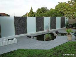 Impressionen Von Exklusiven Sichtschutzelementen In Kombination Von Edelstahl Glas Und Stein Sichtschutzelemente Minibiotop Sichtschutzwande