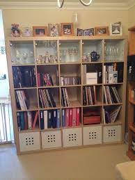 Ikea Expedit Bookcase 5x5 Worked Out Brilliantly For What I Had Intended Glass Doors At The Top For Ornaments And Glasses P Vinyl Storage Craft Room Storage