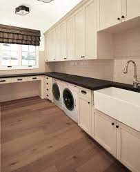 Laundry Room With Cream Cabinets Transitional Laundry Room Laundry Craft Rooms Laundry Room Design Laundry Room Countertop