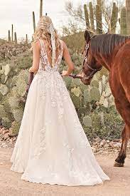 Uszyta na wysokość 167cm + 7.5cm obcas, biust 83cm i talia. Style 66063 Sequined Lace A Line Gown With Chapel Length Train Lillian West