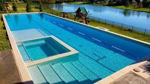 A Lap Pool That Offers Just A Bit More Lap Pools Backyard Lap Pool Designs Indoor Swimming Pool Design