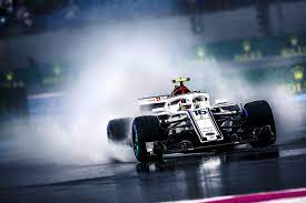 Charles Leclerc Driving Through The Rain On Friday At The French Gp Racing Fantasy Cars Alfa Romeo
