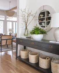 Dark Entry Table With Light Baskets And Light Wood Floor Entry Table Styling Entry Ideas Modern Tran Console Table Decorating Entryway Wall Decor Home Decor